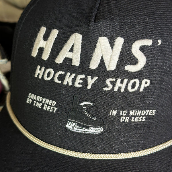 Hans' Hockey Shop (Black) Beauty Status Hockey Co.